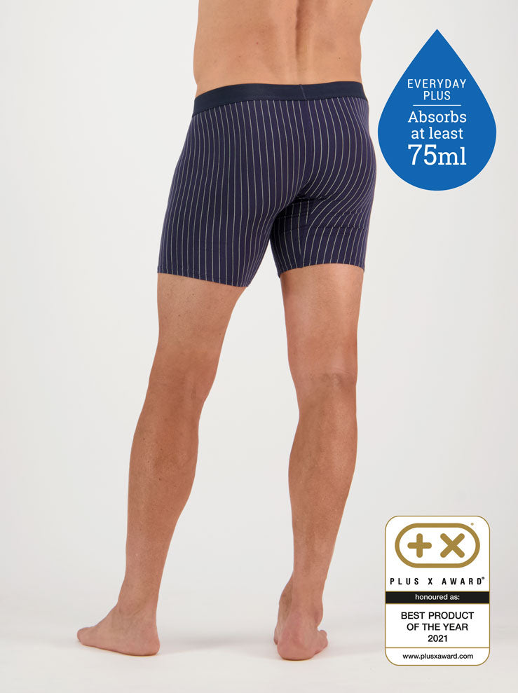 Confitex for Men leakproof long trunks for moderate bladder leakage in navy blue with a grey pinstripe - Back View.
